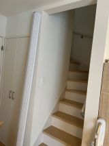 「リビング階段へのパネルドアの取り付け」についての画像